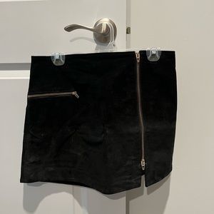 Black suede skirt with gold zippers
